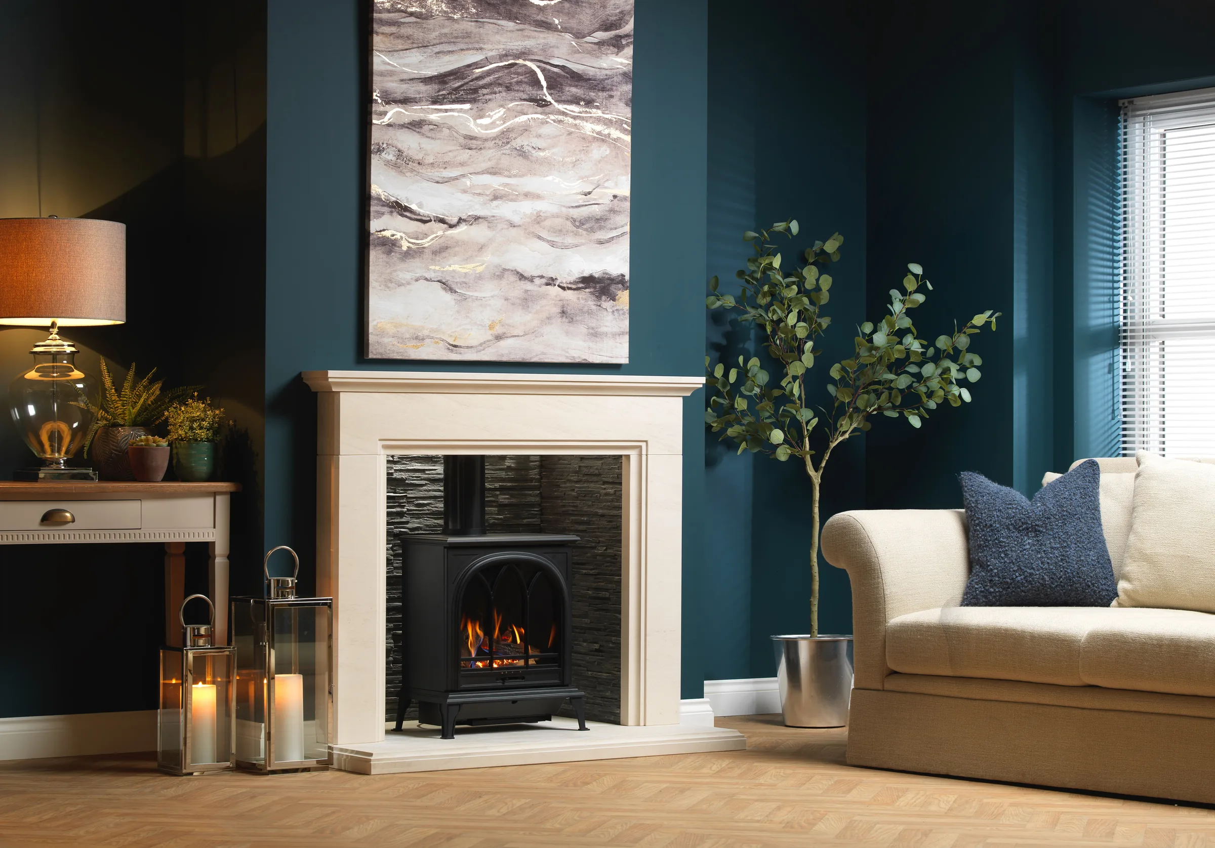 A Wildfire Ravel 400T stove in a contemporary fireplace setting