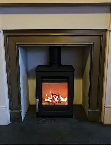 A small stove with traditional detail